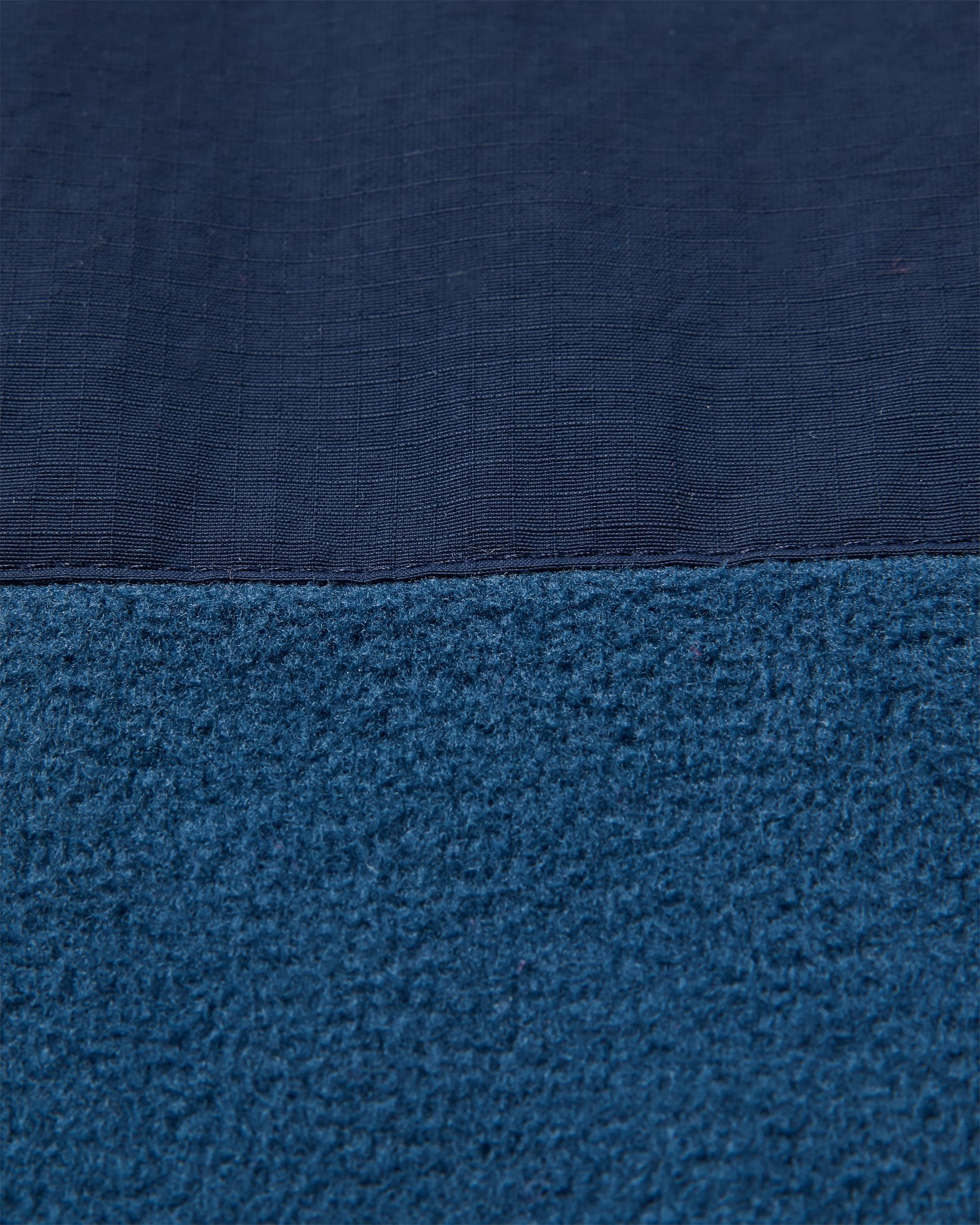 Woodland Hoodless Recycled Polartec® Fleece - Rich Navy/Dark Denim - Flatlay