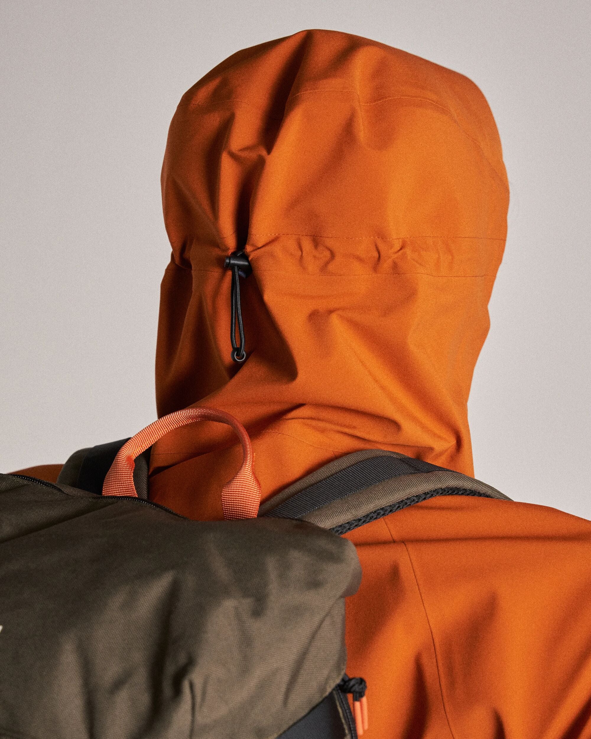 Five Season Recycled Waterproof Jacket - Sunset Orange - Studio Model