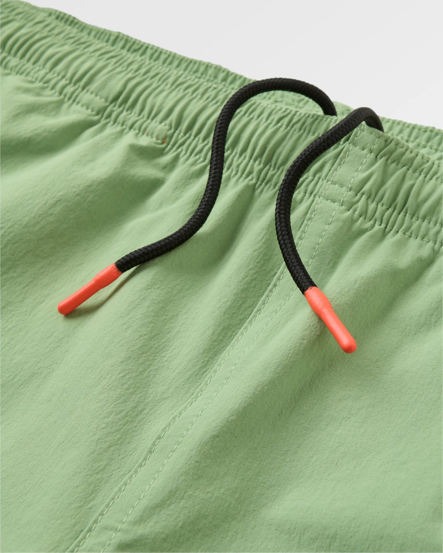 Flaris Netplus® All Purpose Short - Stem Green - Flatlay