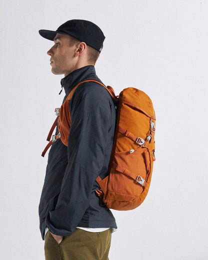 Trailscape Recycled 18L Backpack - Sunrise Orange - Studio Model - Male