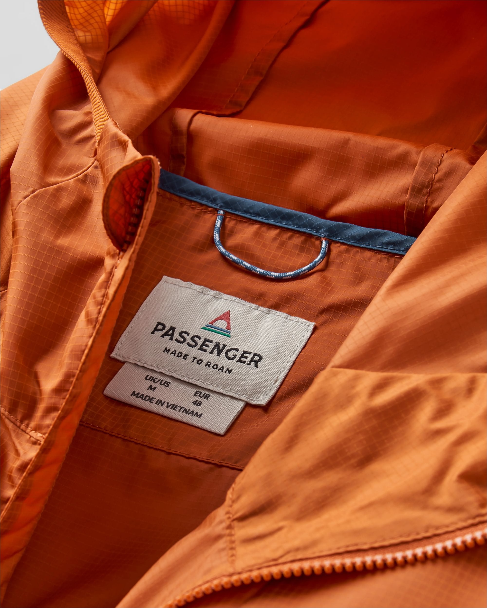 Gusto Recycled Windshell Jacket - Sunset Orange/Charcoal - Flatlay