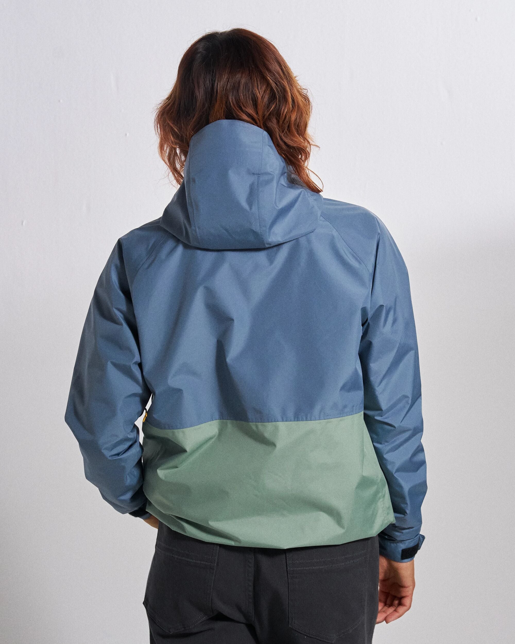 Trailscape Women's Waterproof Jacket - Stormy Blue/Pistachio - Studio Model